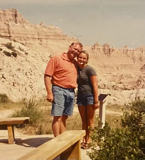 Vintage photo of Mister Greenway founder, Whit, with his daughter Whitney, who now runs the company. A legacy of excellence in home services.